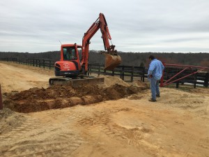 VEA Track Superintendent John Dale Thomas oversees prep work to install drainage tiles at Eagle Point Farm
