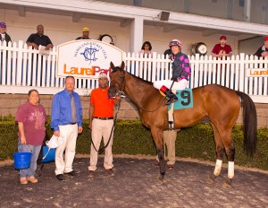 7 year old Rose Brier in the winner's circle after the Henry Clark Stakes. Photo by Jim McCue.