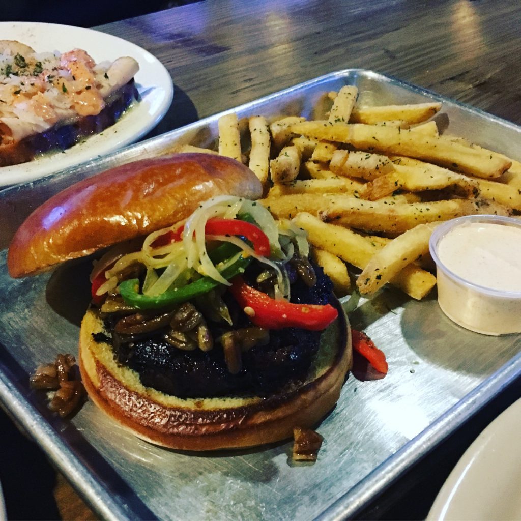 Open face sandwiches are featured at Ponies & Pints, along with over 50 beers on tap 